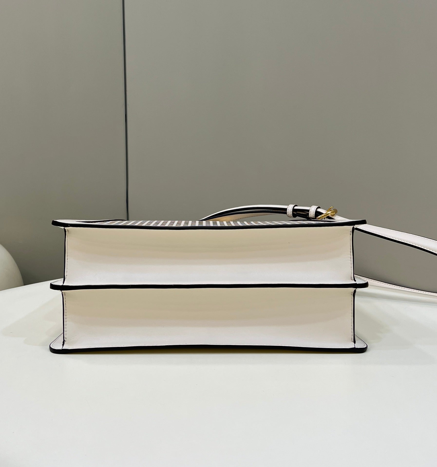 FENDI PEEKABOO ISEEU 34 IN WHITE PERFORATED CALFSKIN GOLD HARDWARE