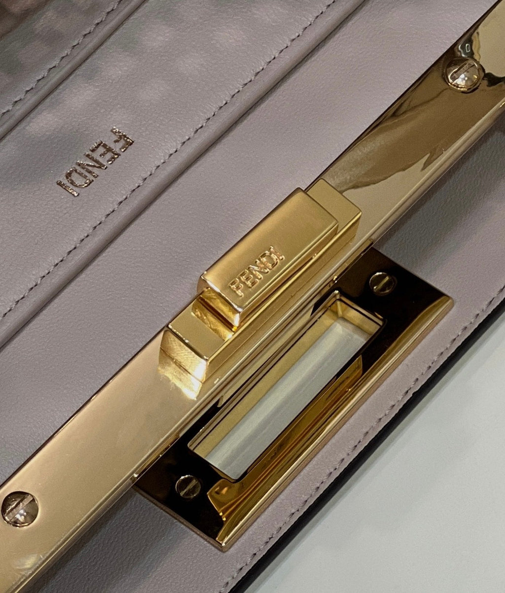 FENDI PEEKABOO ISEEU 34 IN WHITE PERFORATED CALFSKIN GOLD HARDWARE