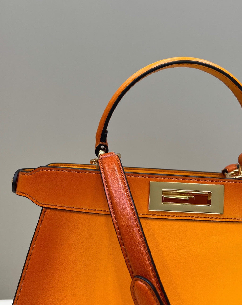 FENDI PEEKABOO ISEEU 33 IN ORANGE OMBRE SMOOTH CALFSKIN GOLD HARDWARE