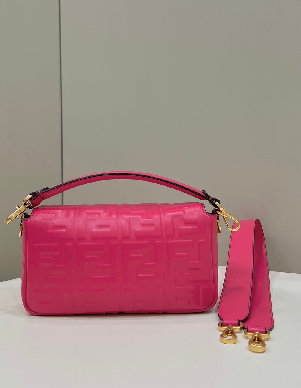 FENDI BAGUETTE WITH FF MOTIF 27 IN CERISH PINK SOFT LAMBSKIN GOLD HARDWARE