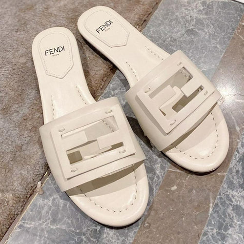 FENDI FENDI BAGUETTE SLIDES IN WHITE LAMBSKIN
