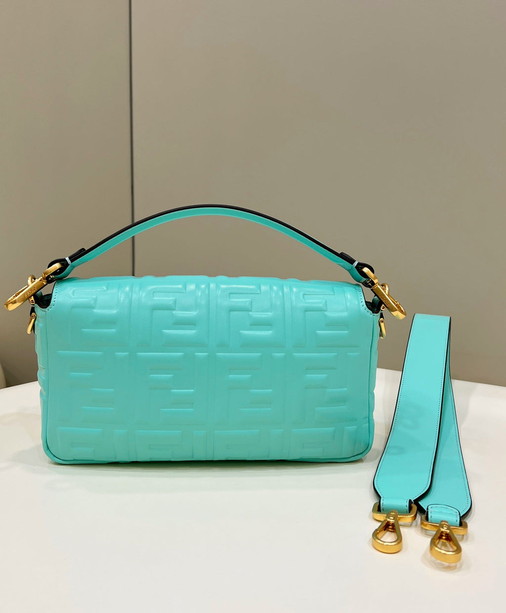 FENDI BAGUETTE WITH FF MOTIF 27 IN TURQUOISE SOFT LAMBSKIN GOLD HARDWARE