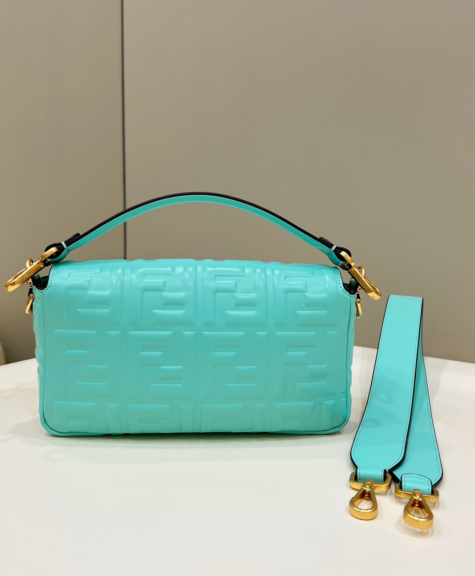 FENDI BAGUETTE WITH FF MOTIF 27 IN TURQUOISE SOFT LAMBSKIN GOLD HARDWARE