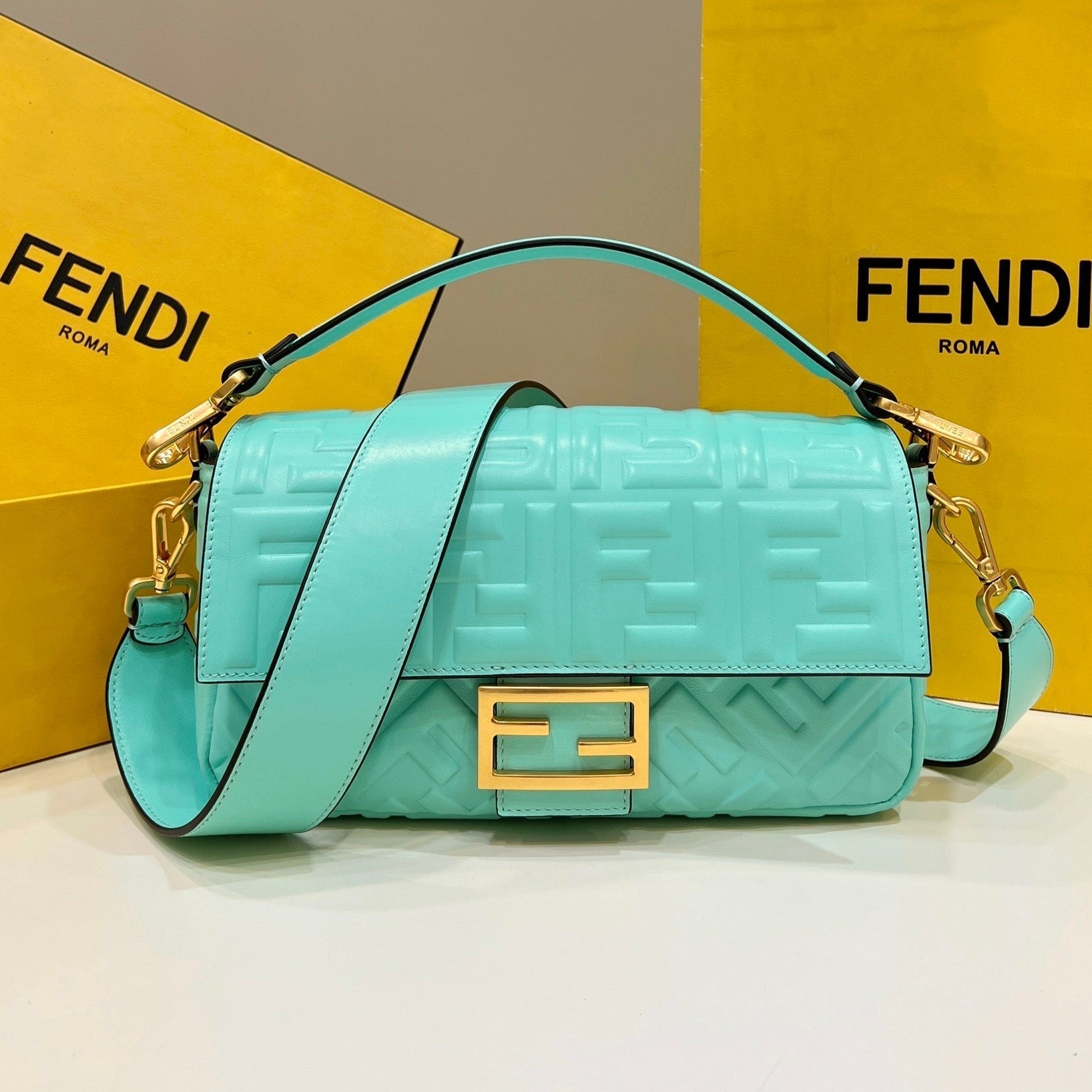 FENDI BAGUETTE WITH FF MOTIF 27 IN TURQUOISE SOFT LAMBSKIN GOLD HARDWARE