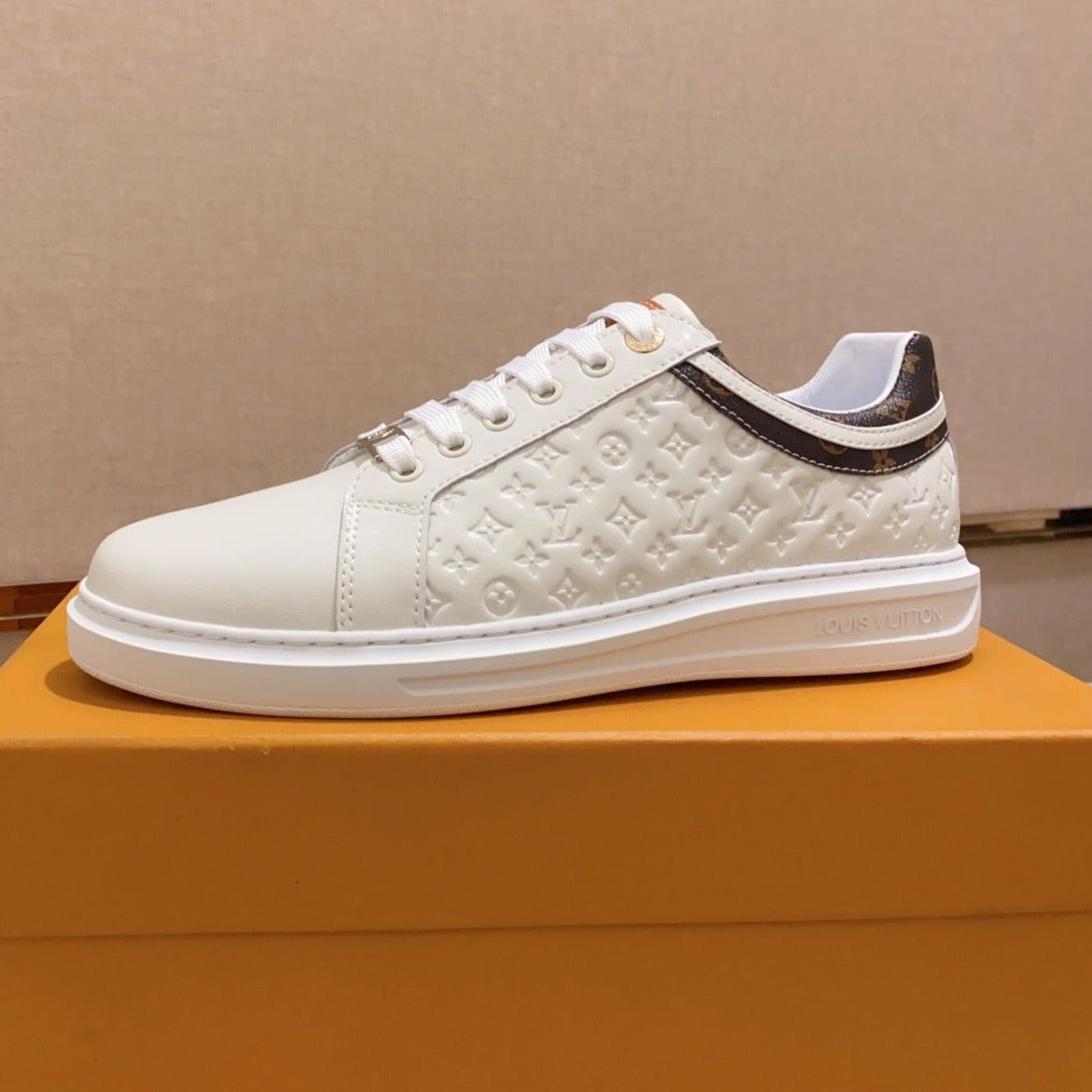 Louis Vuitton RIVOLI SNEAKER WHITE MINI MONOGRAM-EMBOSSED CALFSKIN