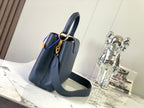 Louis Vuitton capucines mm 31.5 midnight blue taurillon leather gold hardware