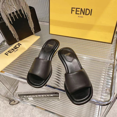 FENDI FENDI BAGUETTE SLIDES WOMEN IN BLACK CALFSKIN