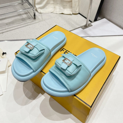 FENDI FENDI BAGUETTE SLIPPERS IN SKY BLUE LAMBSKIN WITH GOLD HARDWARE