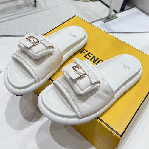 FENDI FENDI BAGUETTE SLIPPERS IN WHITE LAMBSKIN WITH GOLD HARDWARE
