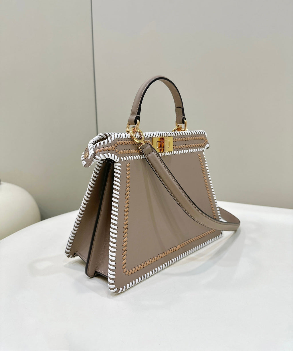 FENDI PEEKABOO ISEEU 27 IN MEDIUM BROWN INTERLACED CALFSKIN GOLD HARDWARE