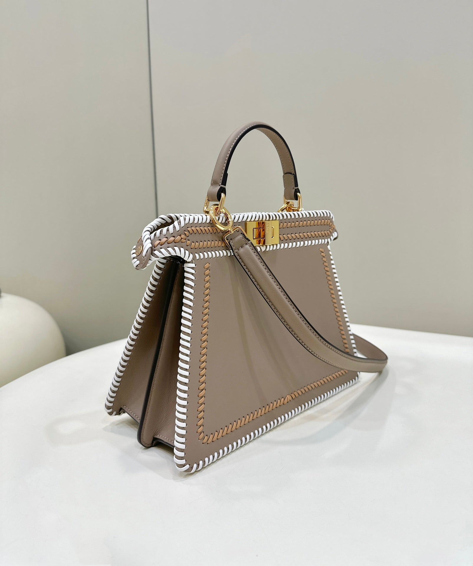 FENDI PEEKABOO ISEEU 27 IN MEDIUM BROWN INTERLACED CALFSKIN GOLD HARDWARE