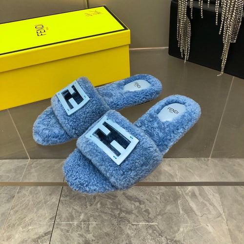FENDI FENDI BAGUETTE SLIDE SLIPPERS IN CERULEAN BLUE WOOL