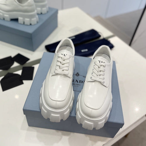 PRADA BRUSHED LEATHER MONOLITH LACE-UP LOAFERS WHITE