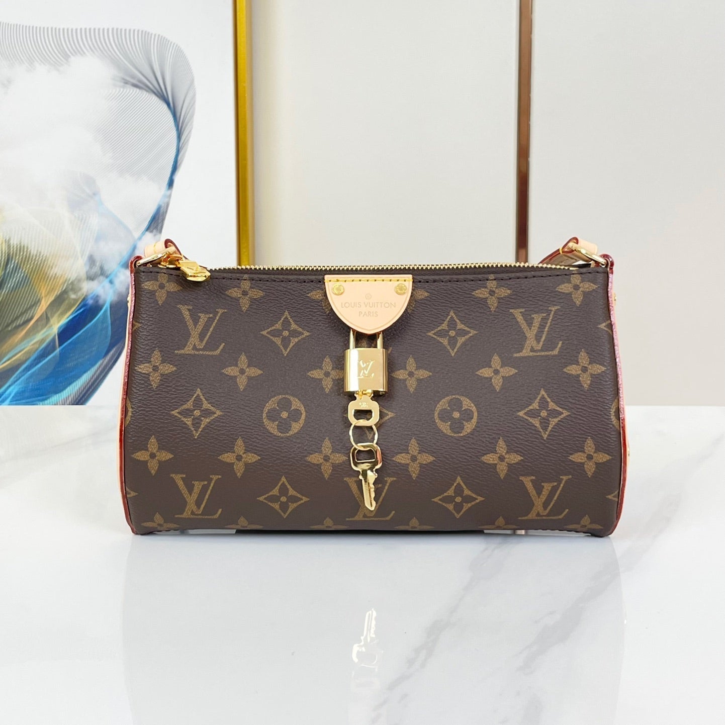 Louis Vuitton POCHETTE TIRETTE 22 IN BROWN MONOGRAM CANVAS GOLD BUCKLE