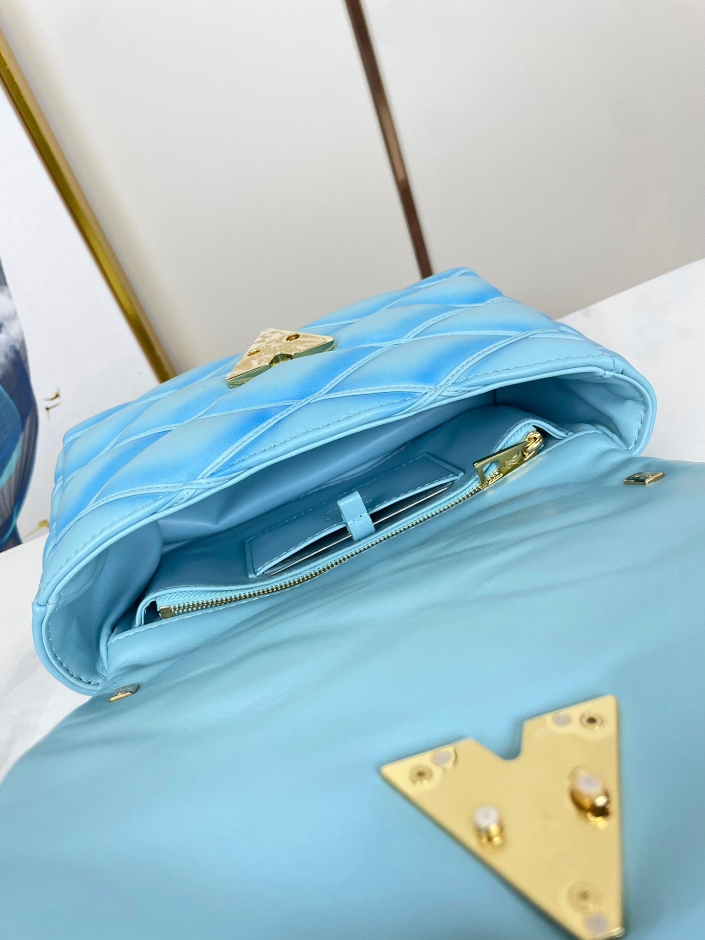 Louis Vuitton GO-14 MM 23 IN SKY BLUE QUILTED LAMBSKIN GOLD HARDWARE