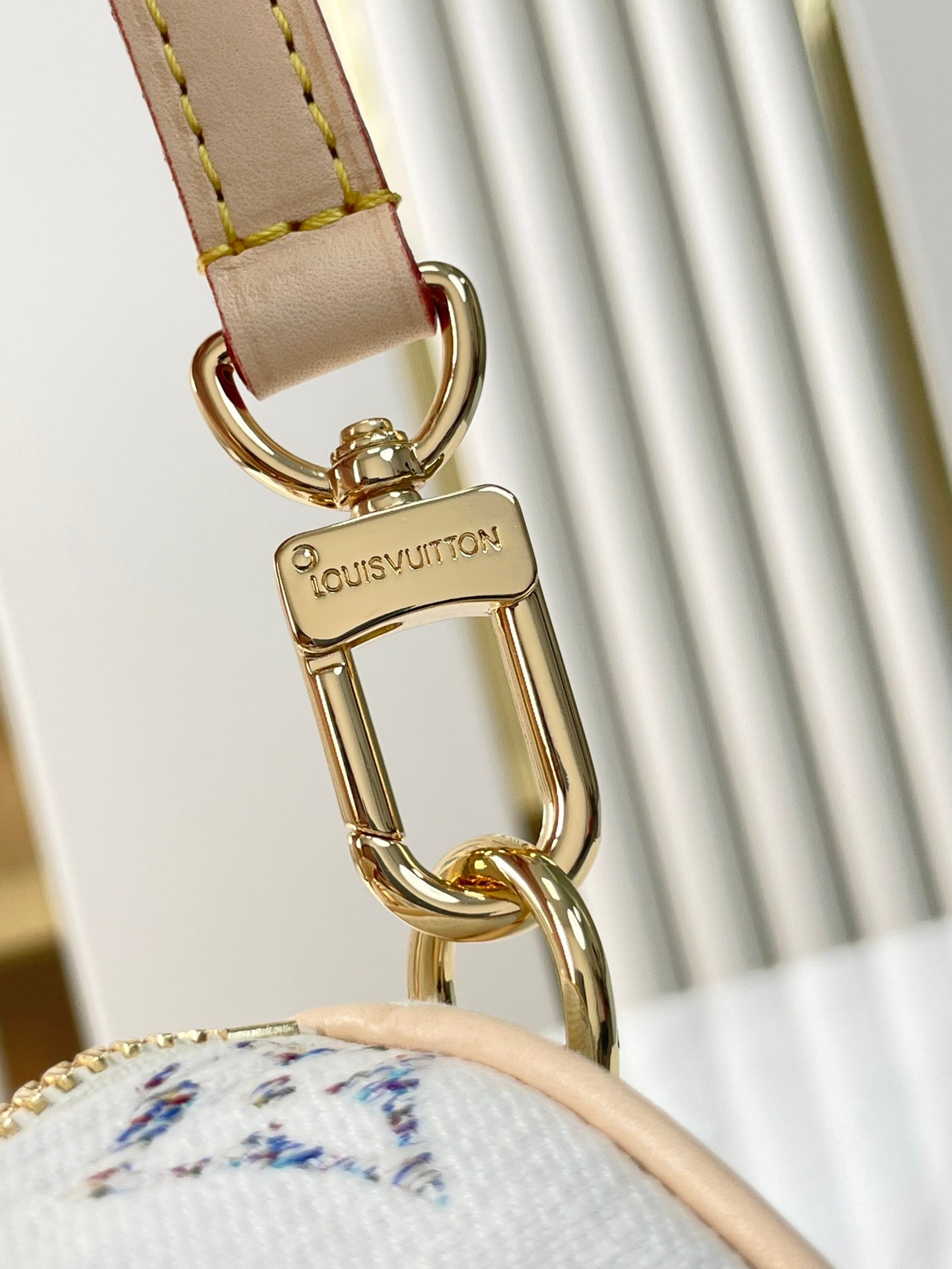 Louis Vuitton SPEEDY BANDOULIÈRE 20 IN WHITE MONOGRAM JACQUARD FABRIC AND BEIGE CALFSKIN TRIM