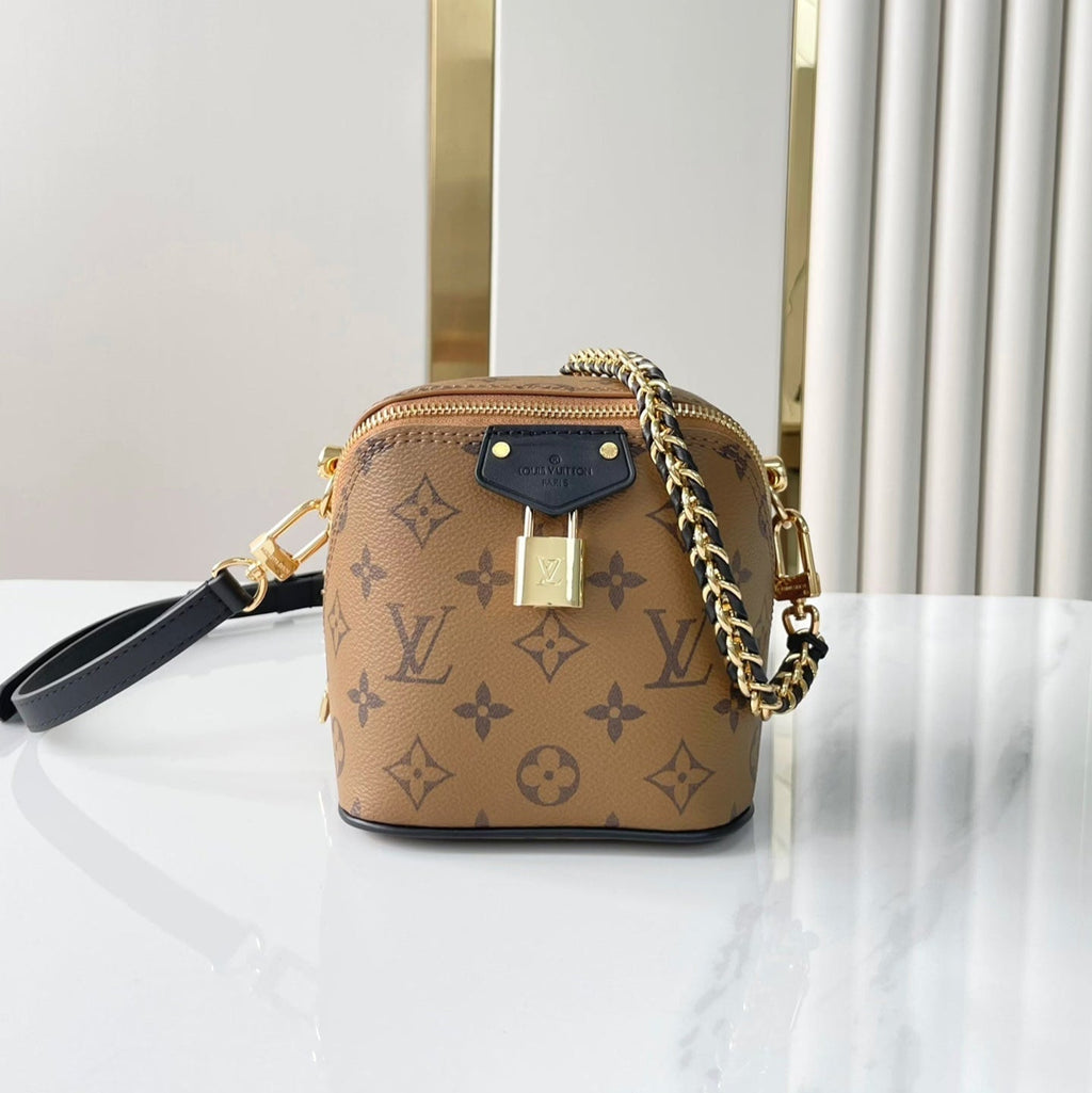 Louis Vuitton JUST IN CASE 14 IN BROWN MONOGRAM REVERSE CANVAS GOLD HARDWARE