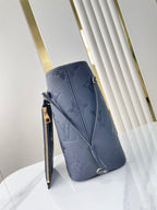 Louis Vuitton NEVERFULL MM 31 IN DARK NAVY MONOGRAM EMPREINTE LEATHER