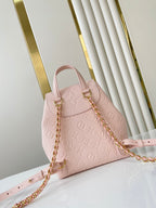 Louis Vuitton BACKUP BACKPACK 22 IN LIGHT PINK MONOGRAM EMPREINTE LEATHER