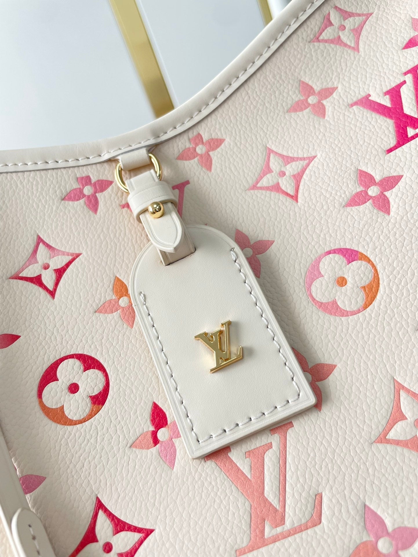 Louis Vuitton CARRYALL PM 29 IN SUNRISE AQUARELLE MONOGRAM EMPREINTE LEATHER