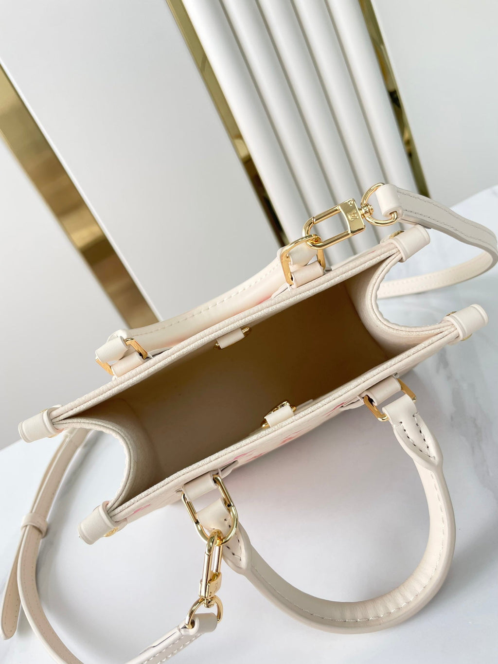 Louis Vuitton ONTHEGO BB 18 IN SUNRISE AQUARELLE MONOGRAM EMPREINTE LEATHER