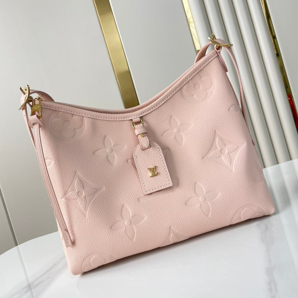 Louis Vuitton CARRYALL 29 IN LIGHT PINK MONOGRAM EMPREINTE LEATHER