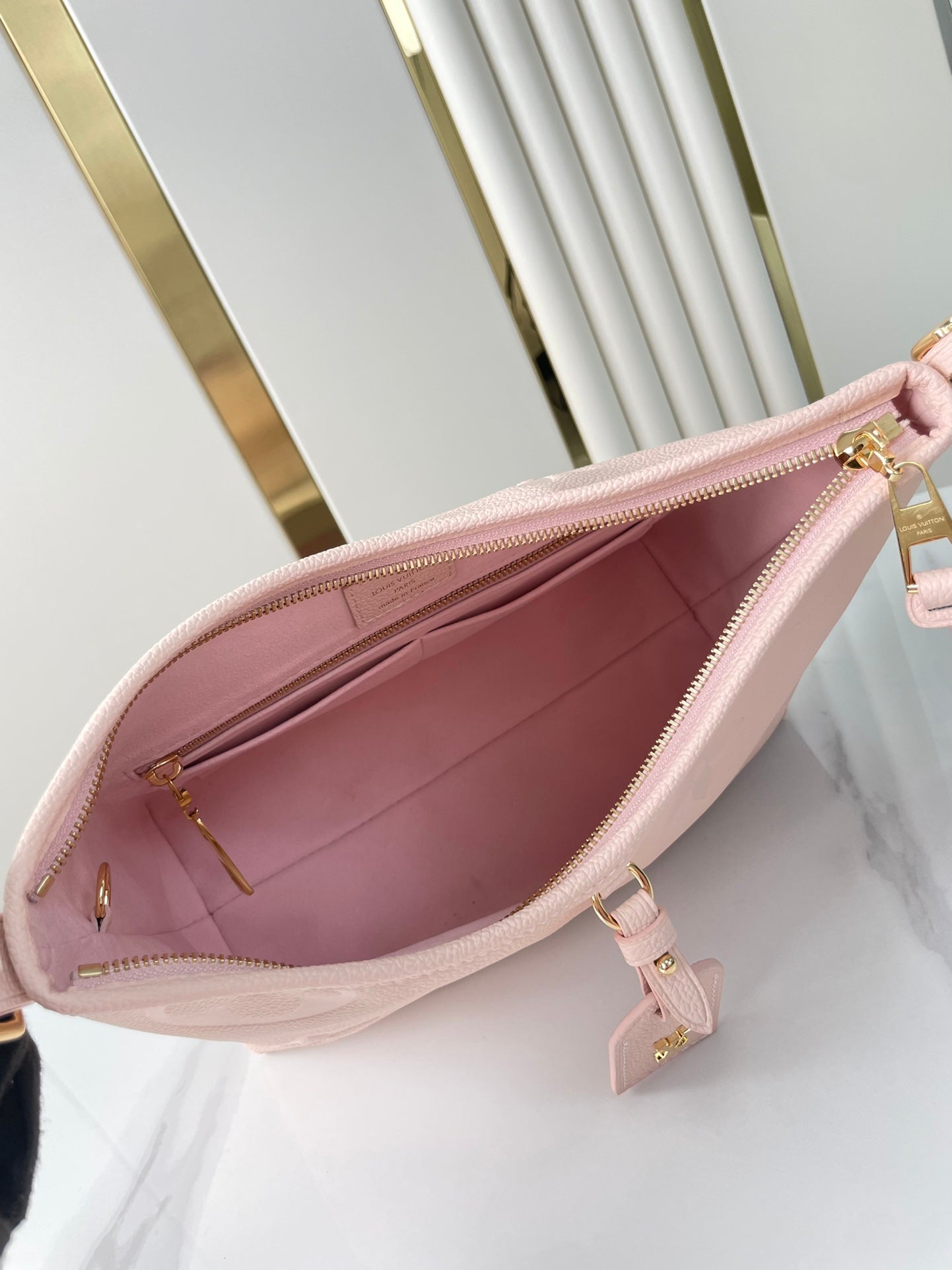 Louis Vuitton CARRYALL 29 IN LIGHT PINK MONOGRAM EMPREINTE LEATHER