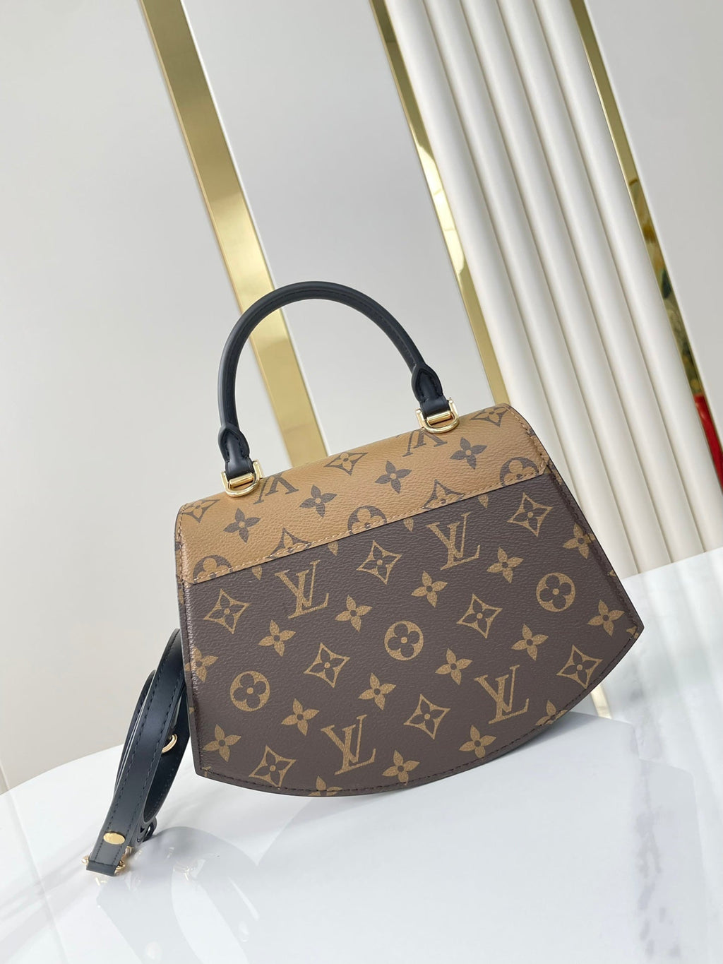 Louis Vuitton TILSITT 24 IN BROWN MONOGRAM AND MONOGRAM REVERSE CANVAS GOLD BUCKLE