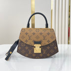 Louis Vuitton TILSITT 24 IN BROWN MONOGRAM AND MONOGRAM REVERSE CANVAS GOLD BUCKLE