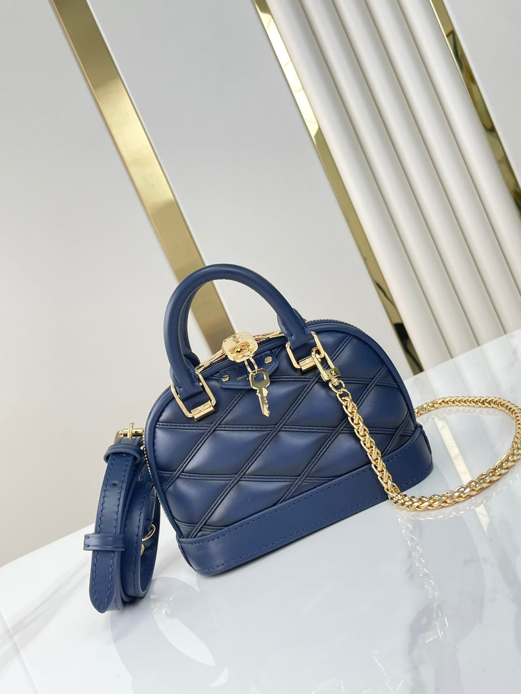 Louis Vuitton NANO ALMA 18 IN NAVY BLUE QUILTED LAMBSKIN GOLD HARDWARE