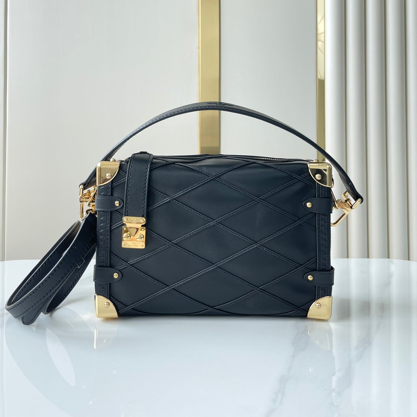 Louis Vuitton SIDE TRUNK 21 IN BLACK LAMBSKIN WITH CRISS CROSS PATTERN GOLD HARDWARE