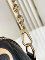 Louis Vuitton SPEEDY BANDOULIÈRE 20 IN BLACK CREAM MONOGRAM EMPREINTE LEATHER GOLD HARDWARE