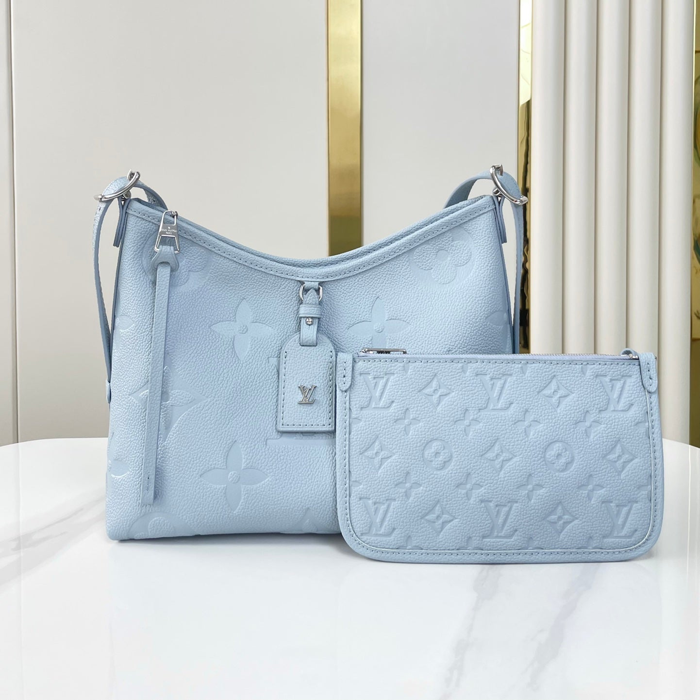 Louis Vuitton CARRYALL PM 29 IN BEAU BLUE MONOGRAM EMPREINTE LEATHER