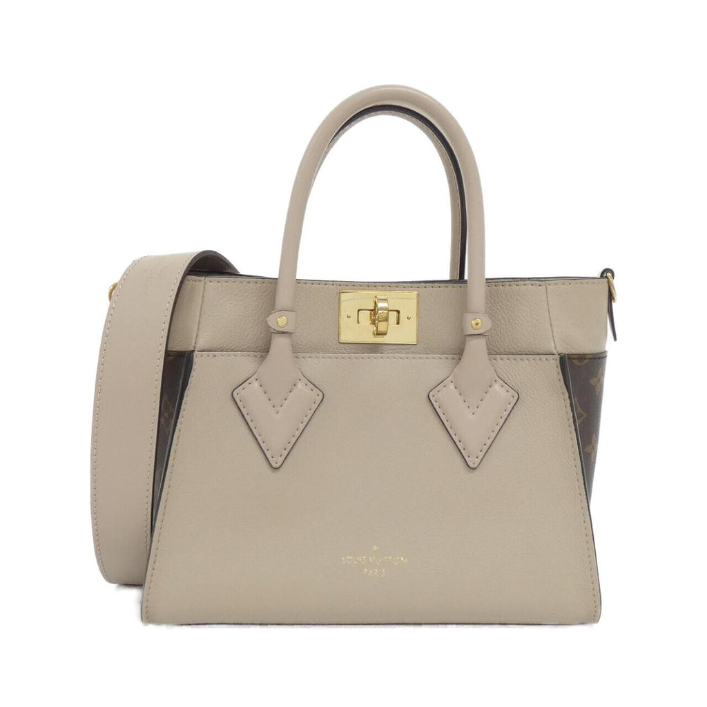 Louis Vuitton On My Side Calf Coated Canvas Bag