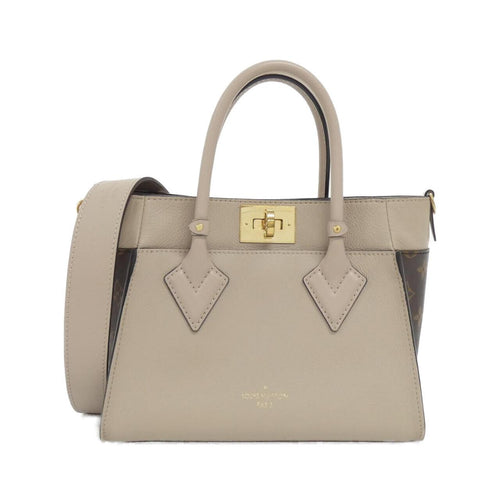 Louis Vuitton On My Side Calf Coated Canvas Bag