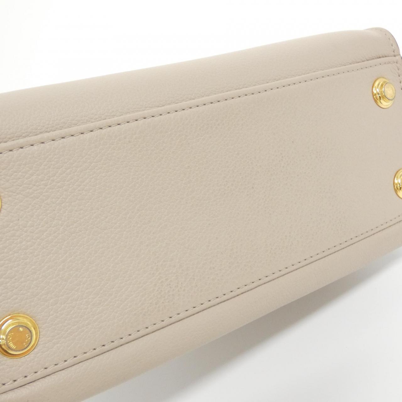 Louis Vuitton On My Side Calf Coated Canvas Bag