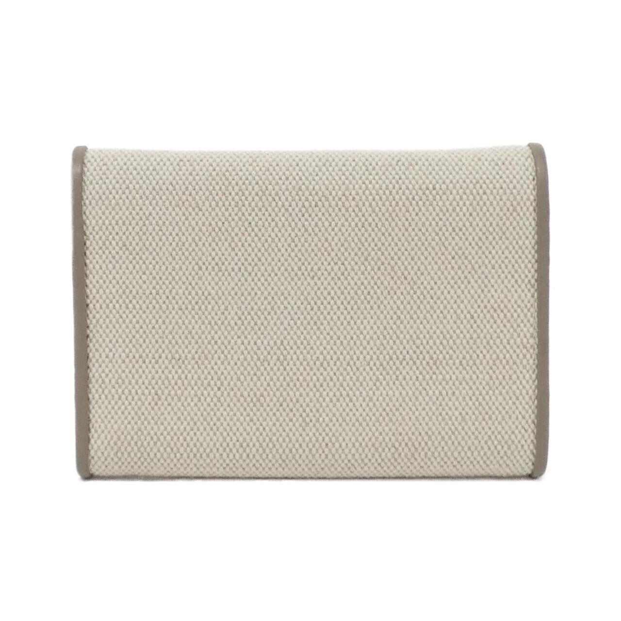 Louis Vuitton Portefeuille Capucines Compact Canvas Wallet
