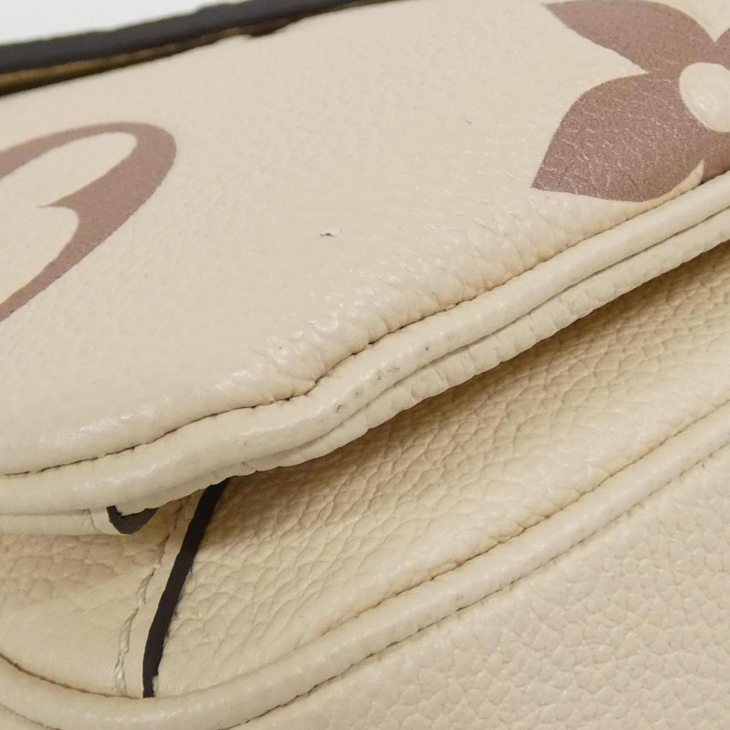 Louis Vuitton Pochette Metis Monogram Empreinte Shoulder Bag