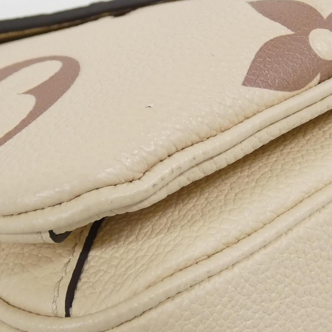 Louis Vuitton Pochette Metis Monogram Empreinte Shoulder Bag