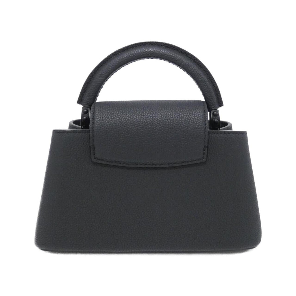 Louis Vuitton Capucines EW MINI Calf Bag