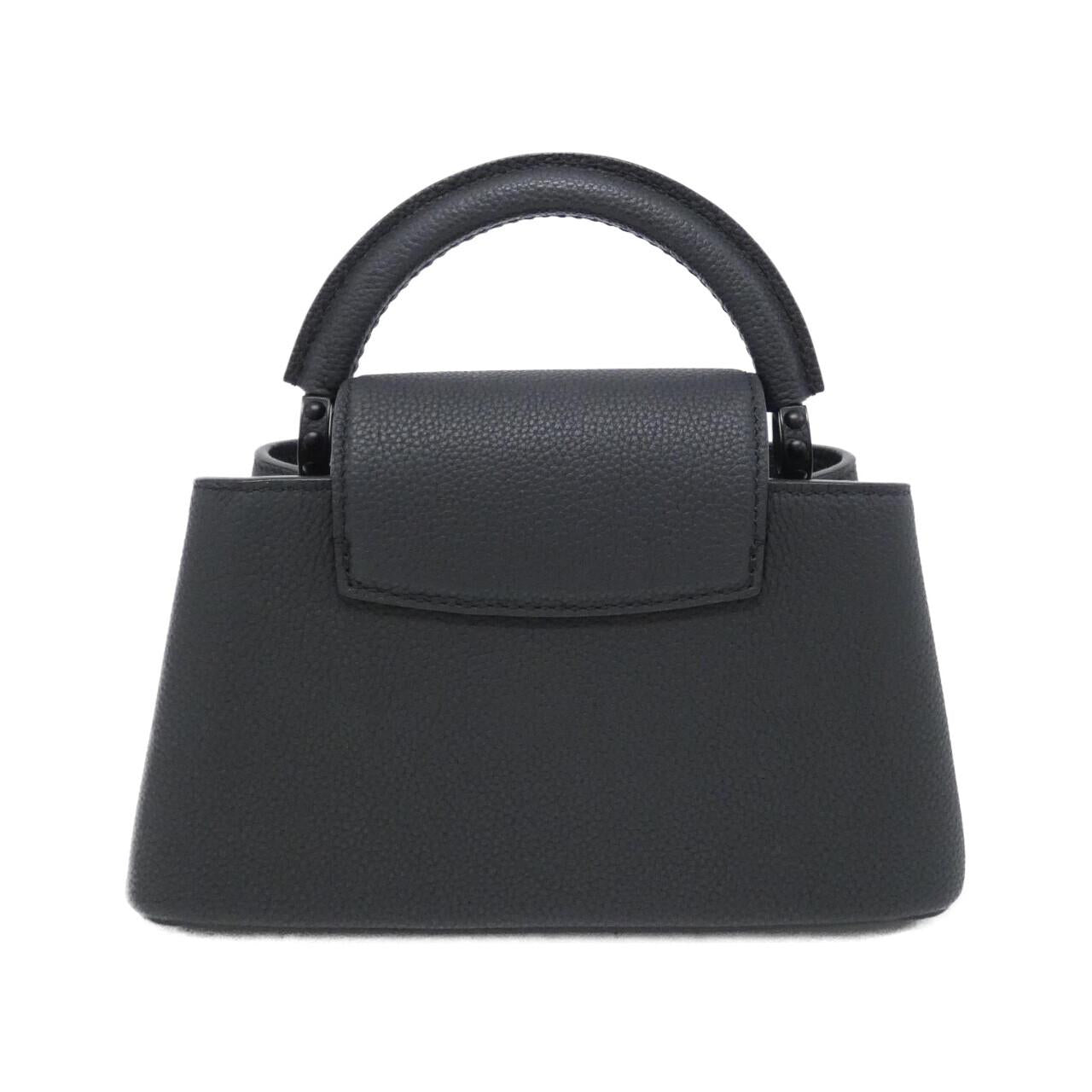 Louis Vuitton Capucines EW MINI Calf Bag