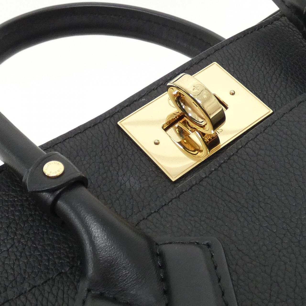 Louis Vuitton On My Side Calf Coated Canvas Bag