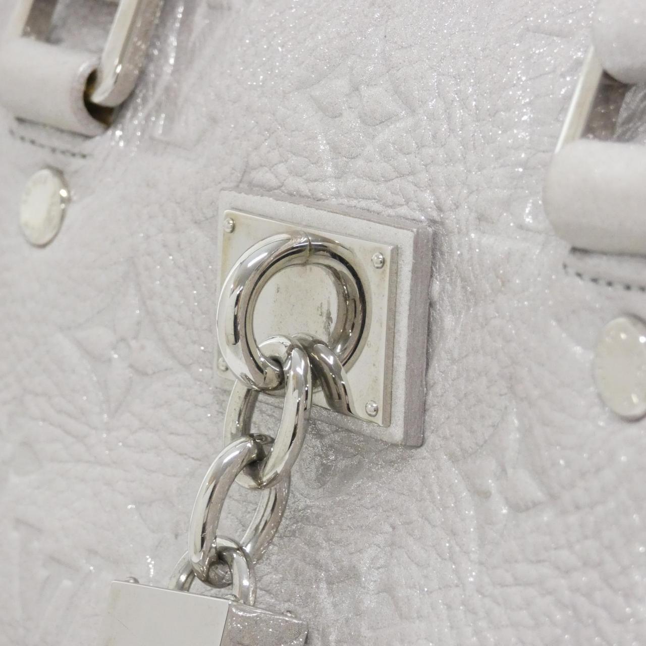 Louis Vuitton Monogram Shimmer Comete Bag