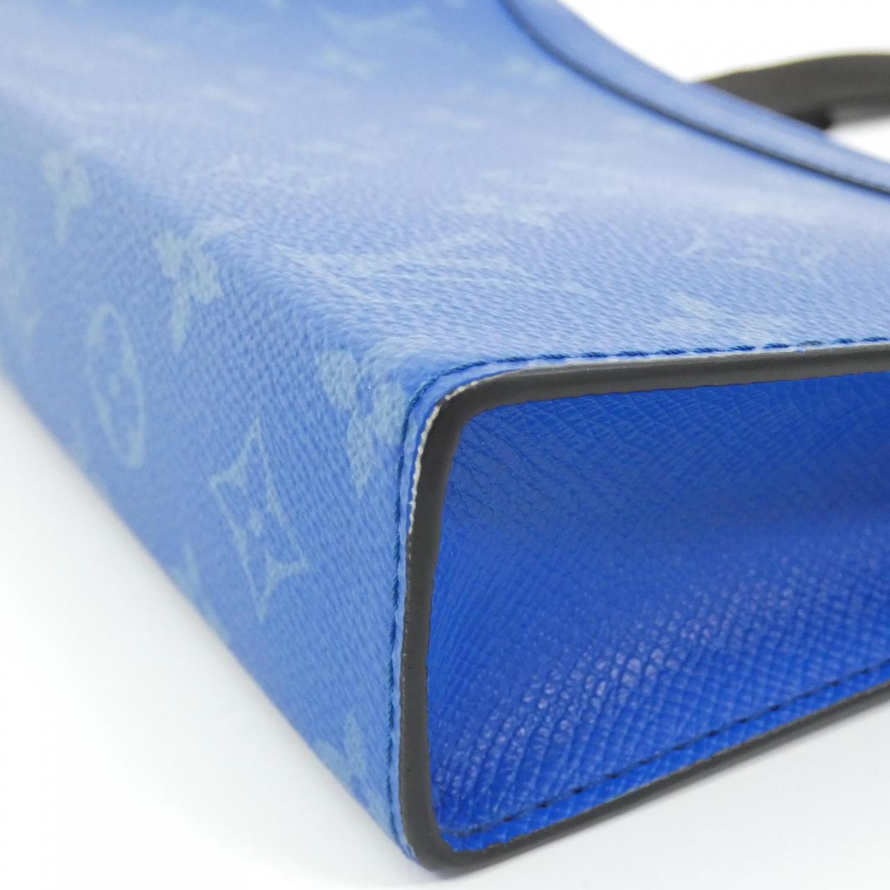Louis Vuitton Taiga Lama Gaston Wearable Wallet Coated Canvas Calf Shoulder Bag