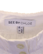See By Chloe Cut Out Shoulder Top in White Cotton