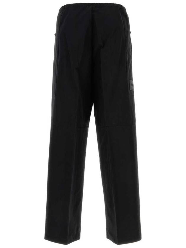 Fendi logo patch drawstring straight pants black