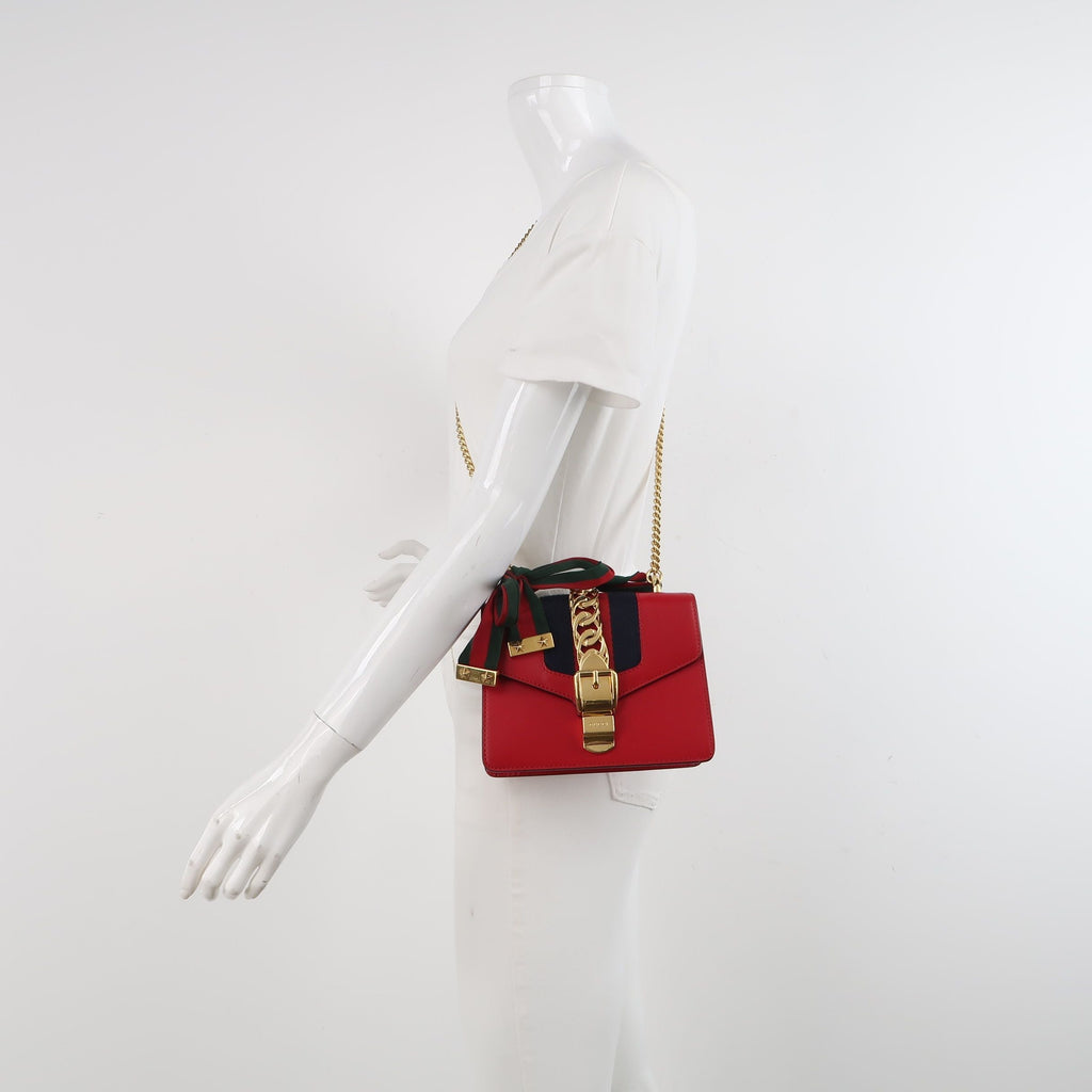 Gucci Sylvie Mini Leather Crossbody Bag with Metal Buckle and Ribbon 250430781173189