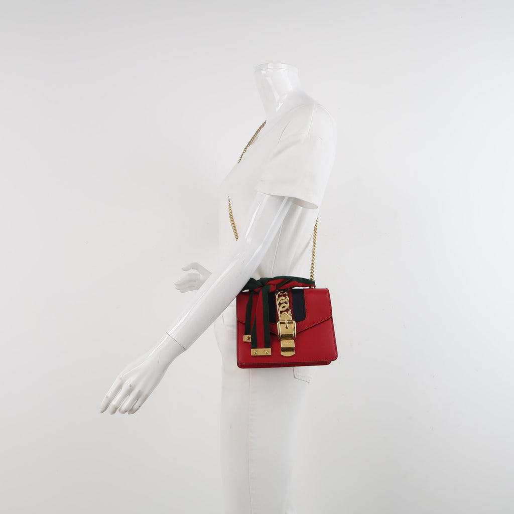 Gucci Sylvie Mini Leather Crossbody Bag with Ribbon and Metal Buckle 250430781173197
