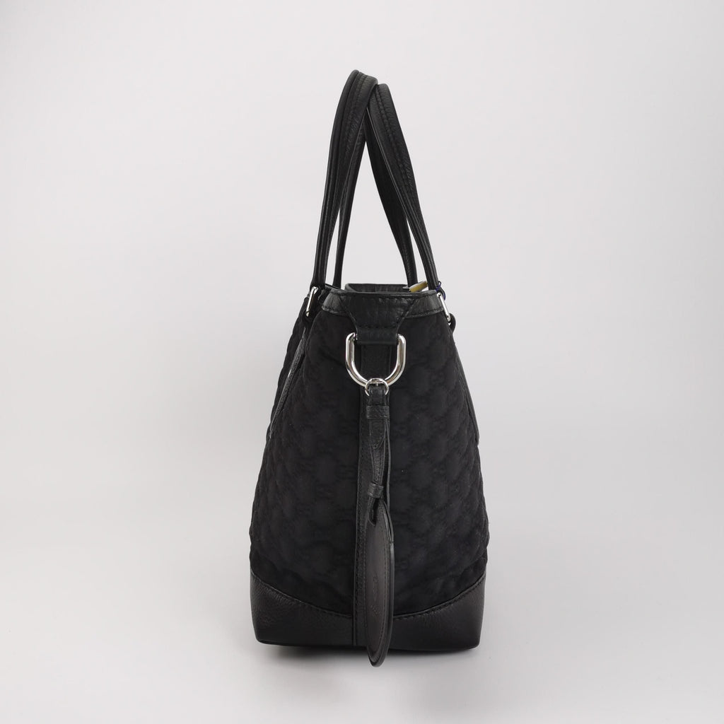 Gucci GG Embossed Shoulder Bag in Leather and Nylon 250315781106702