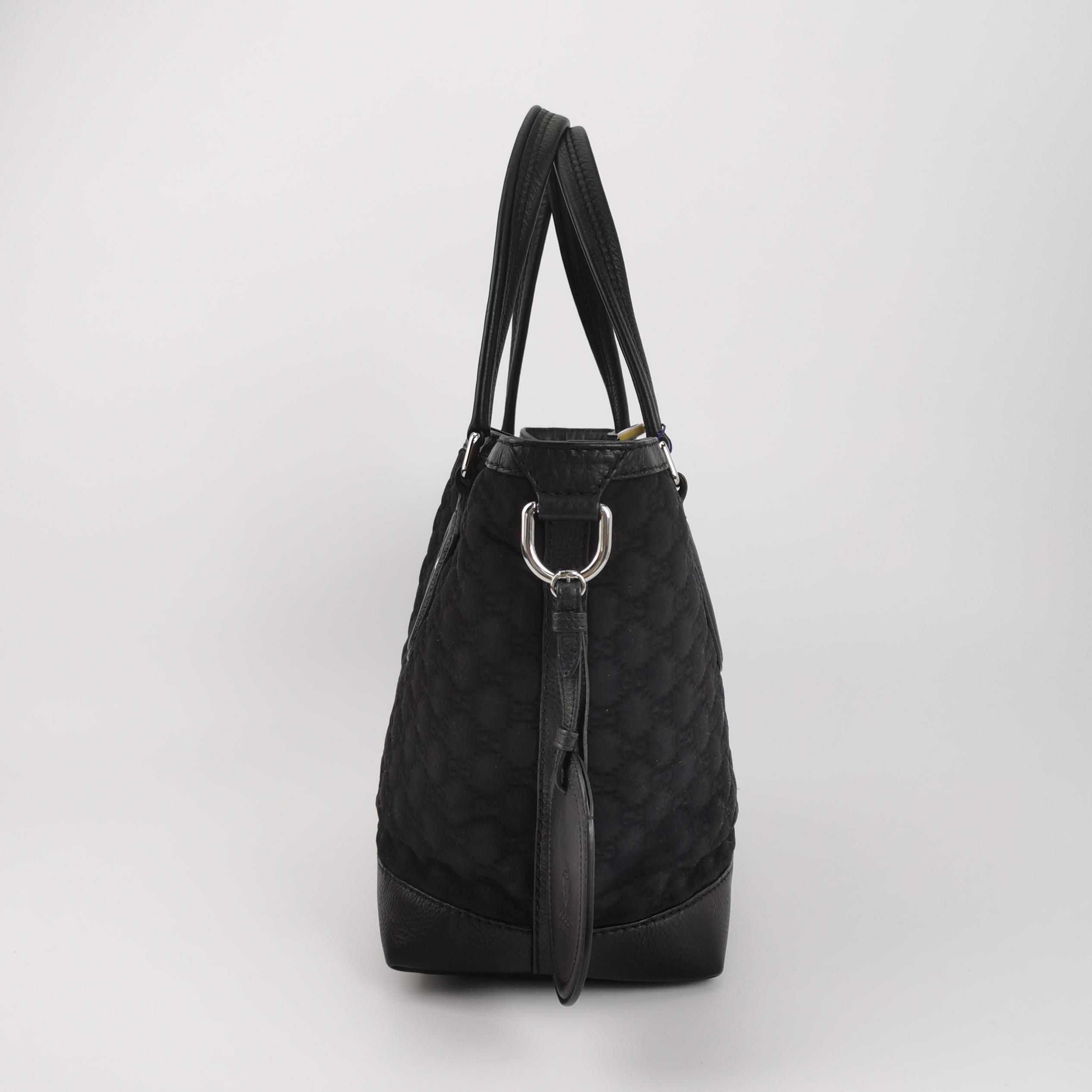 Gucci GG Embossed Shoulder Bag in Leather and Nylon 250315781106702